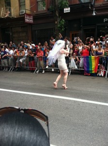 man in bridal attire in parade